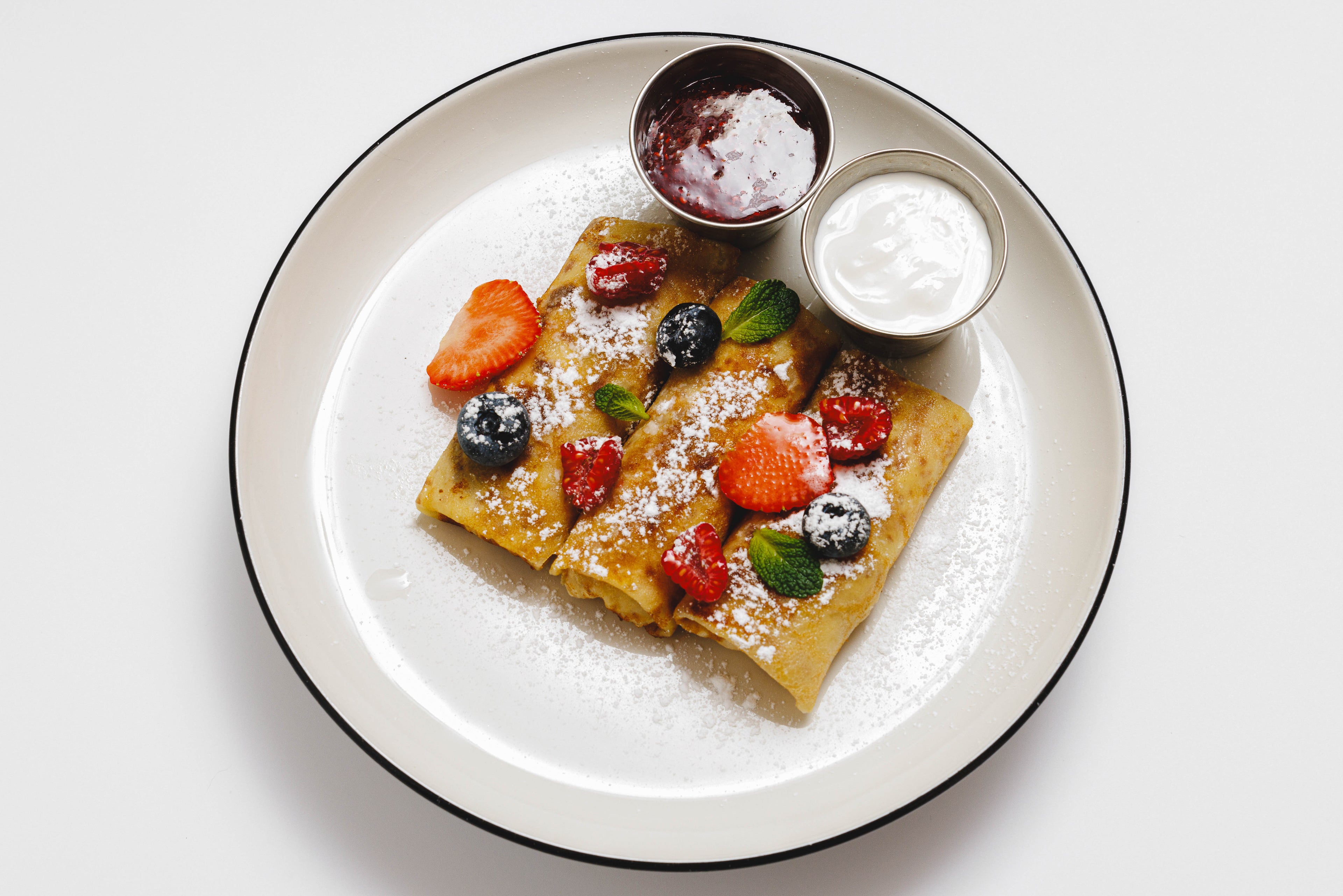 Млинці з сиром і родзинками